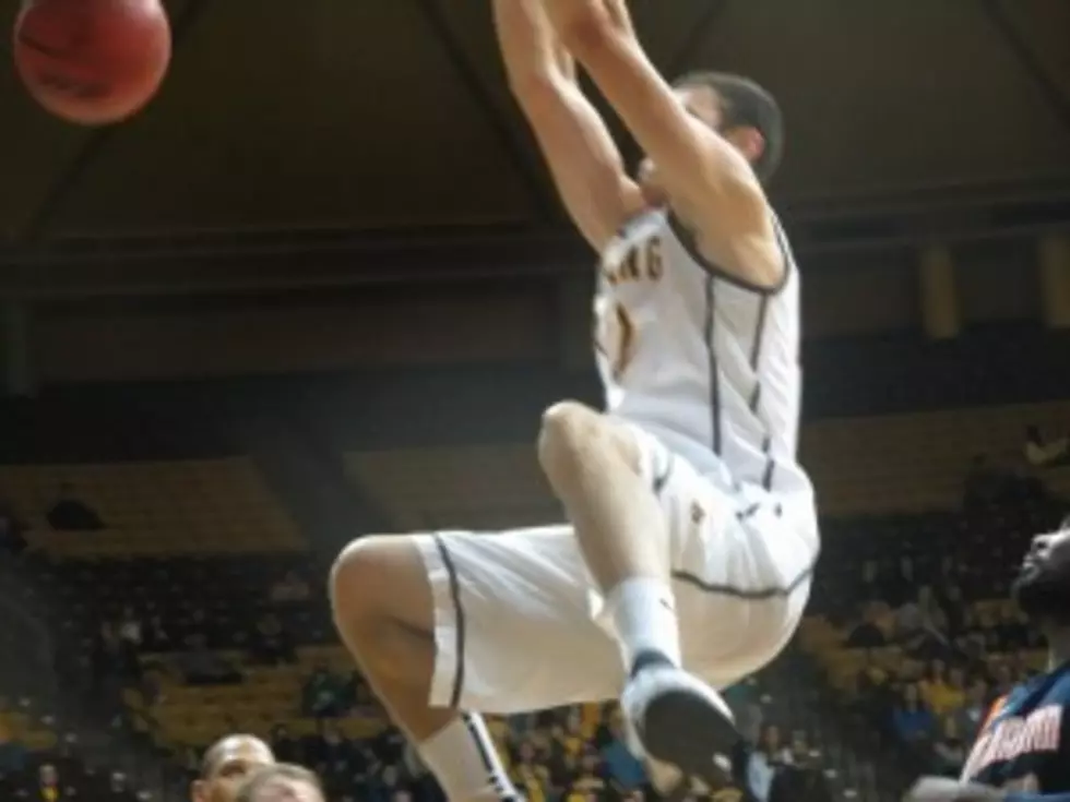 Wyoming Cowboys Avoid Sting in 79-65 Victory