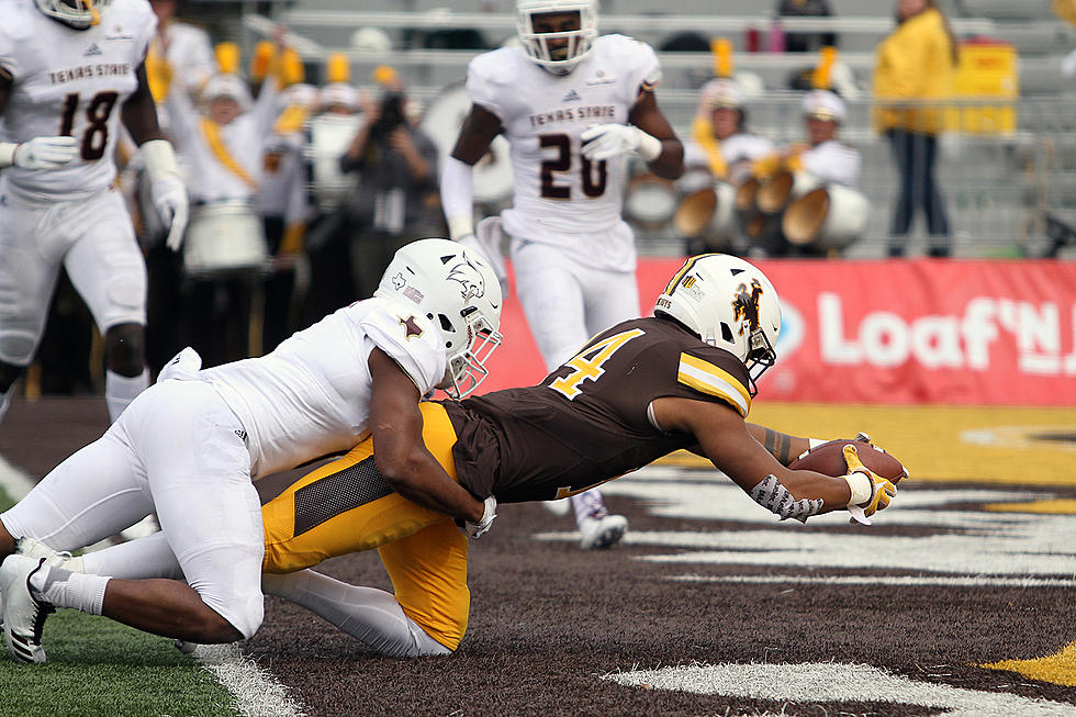 Cowboys Comeback to Beat Aggies, 28-23