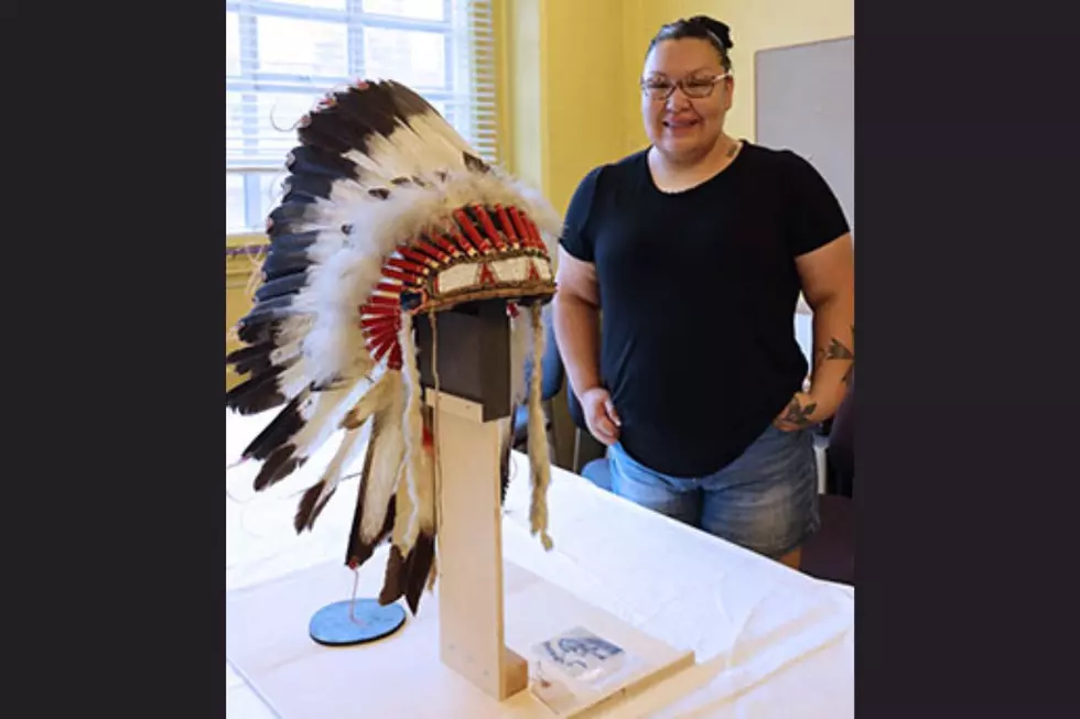 Arapaho Student Reunites with Tribal Headdress at UW
