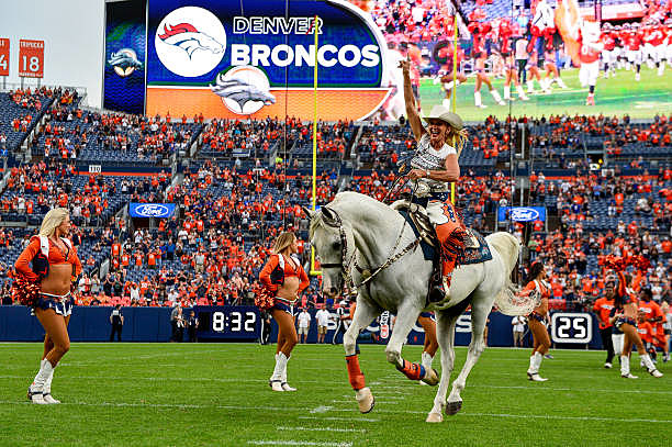 Broncos mascots young Miles and Barrel Man perform before a game News  Photo - Getty Images