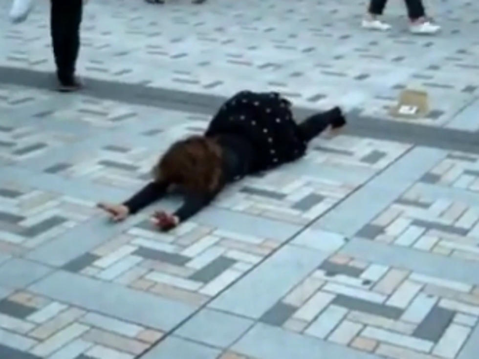 Woman Does Insane, Spastic Dubstep Dance in Public [VIDEO]