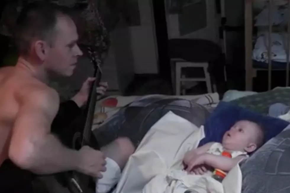 Dad Soothes Baby with Metallica