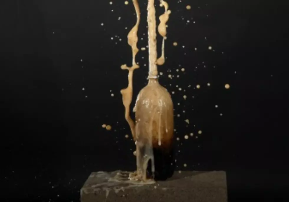 Dude Covers Himself in Mentos, Jumps into Coke Bath [VIDEO]