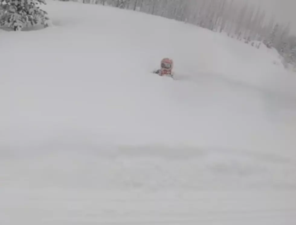 Watch Snowmobiler Get Swallowed by Deep Snow