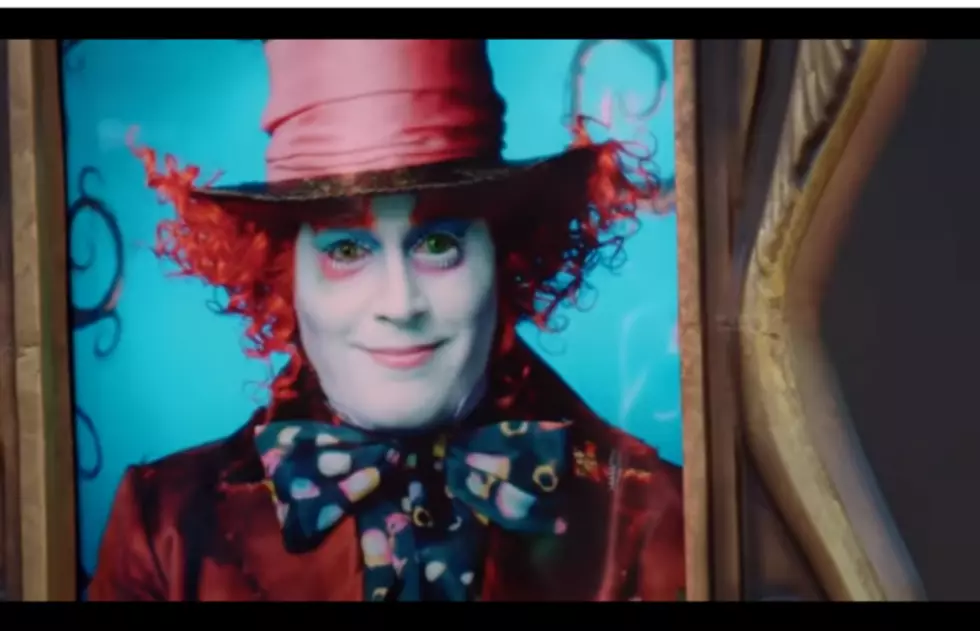 Watch Johnny Depp surprise Disneyland visitors as the Mad Hatter