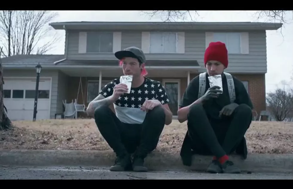 twenty one pilots long for “the good old days” in somber “Stressed Out” video