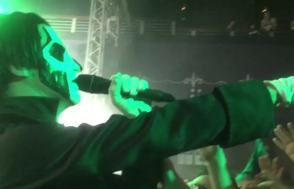 Ghost singer falls off stage, keeps performing like a champ