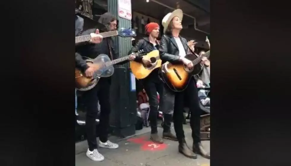 Dave Grohl rocks surprise street performance with Brandi Carlile