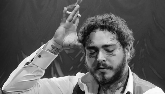Post Malone shows off his tattoofree face in new throwback video  PopBuzz