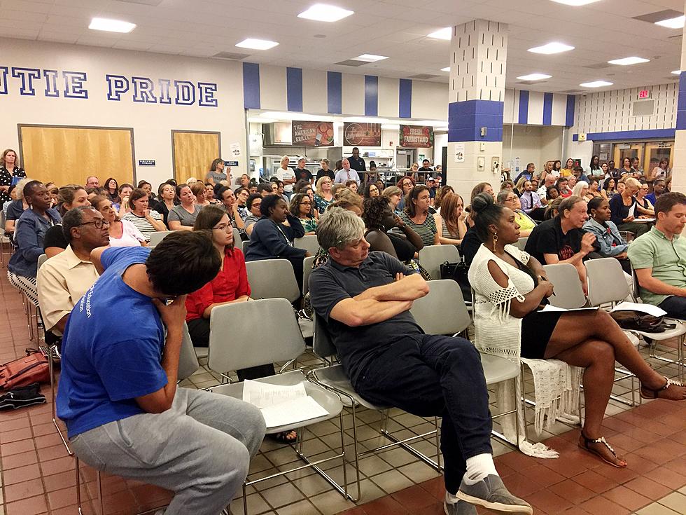 Teachers want answers to delay in pay raises, problems with new contract