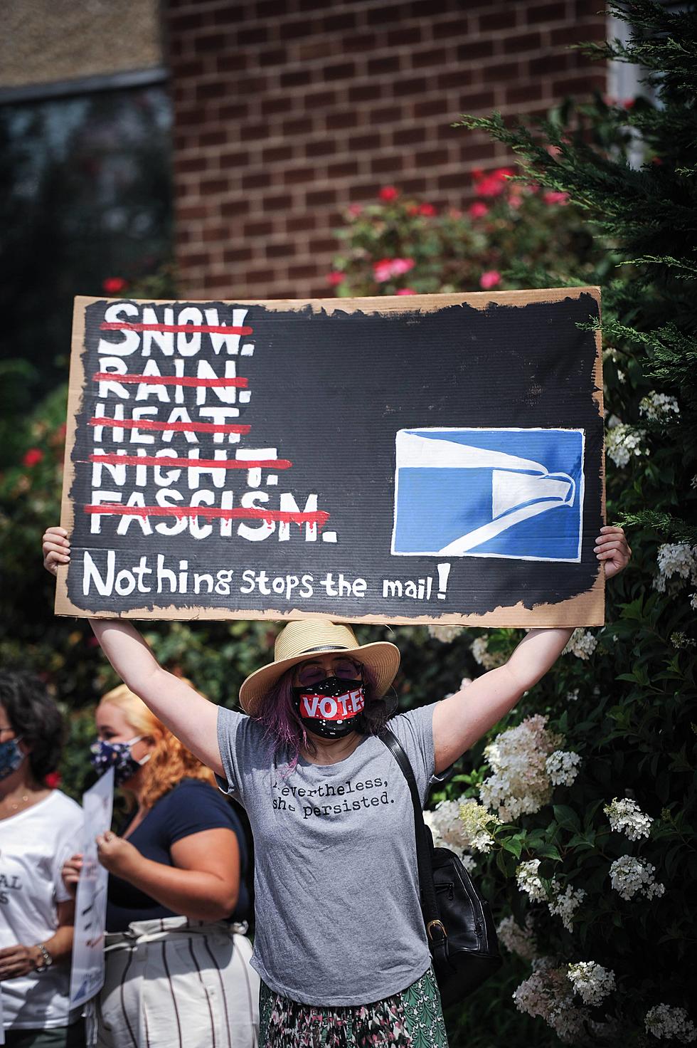 Concerned with elections, mail service overall, Montclair protests at post office