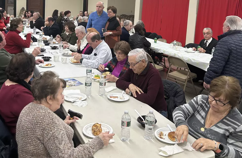 Our Lady of Mount Carmel members give their church a financial boost