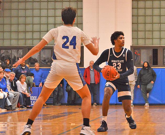 Immaculate Conception Tavian Pullock (right) scored 18 points against Roselle Catholic in the Non Public North B state sectional finals on March 1. The sixth-seeded Lions lost, 71-61, to fourth-seeded Roselle Catholic at Franklin High School. (EDWARD KENSIK/STAFF)