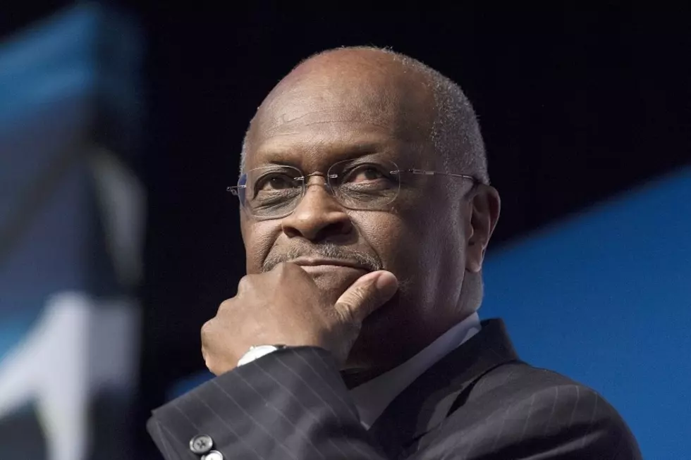 Trump ally Hermain Cain hospitalized with COVID after Trump&#8217;s OK rally