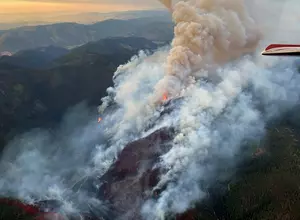 Miller Peak fire not yet on city land; trail closures could come