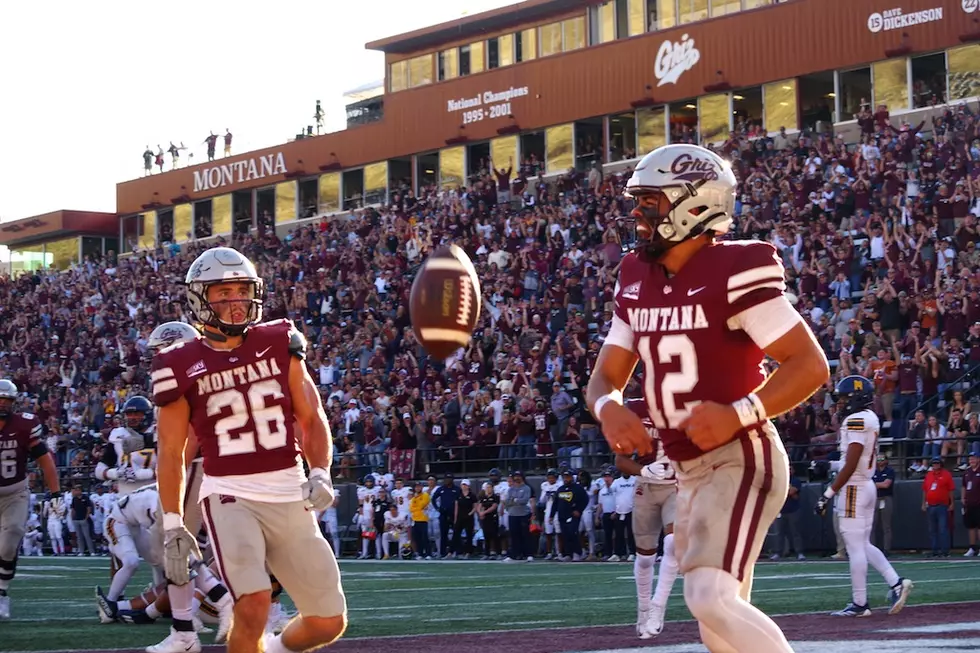 Logan Fife spikes the football after scoring a touchdown. (William Munoz/Missoula Current)