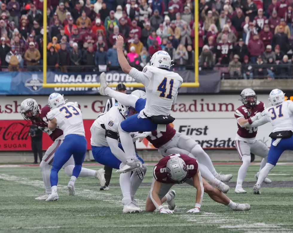 South Dakota State punter Max Pelham is pressured. (William Munoz/Missoula Current)