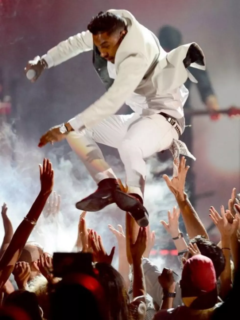 Watch Miguel Leg Drop Fans On Stage! [VIDEO]