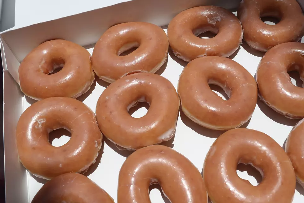 Dozen Krispy Kreme doughnuts for $1