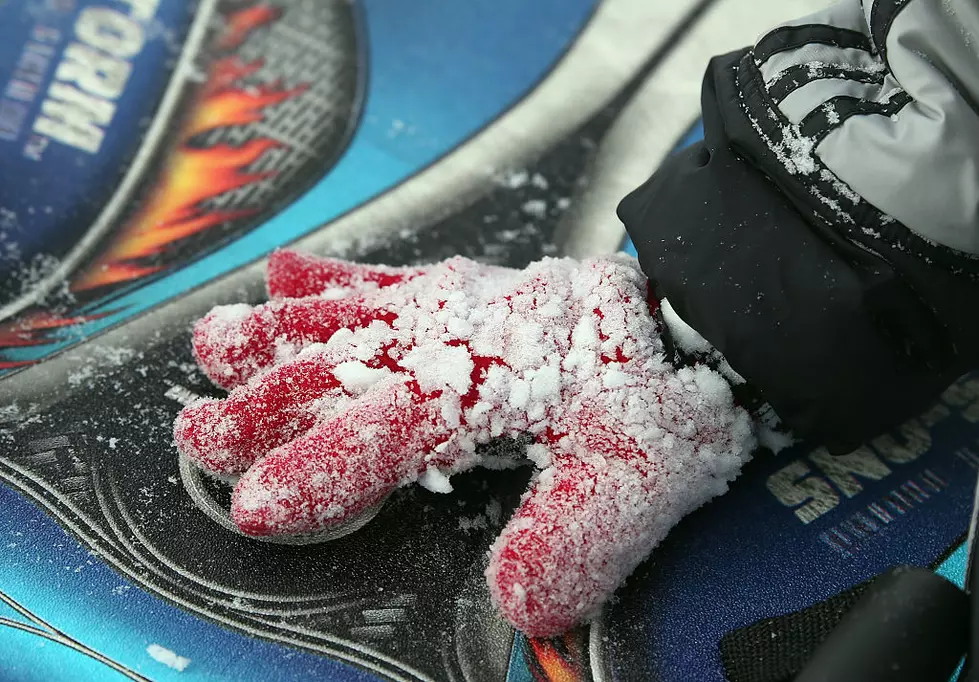 Blizzard Barrels Into Northeastern U.S. OLD BETHPAGE, NY - JANUARY 27: A child's glove is crusted in snow on January 27, 2015 in Old Bethpage. New York. The Long Island region received between twelve and thirty inches of snow overnight into midday Tuesday from Winter Storm Juno. (Photo by Bruce Bennett/Getty Images)
