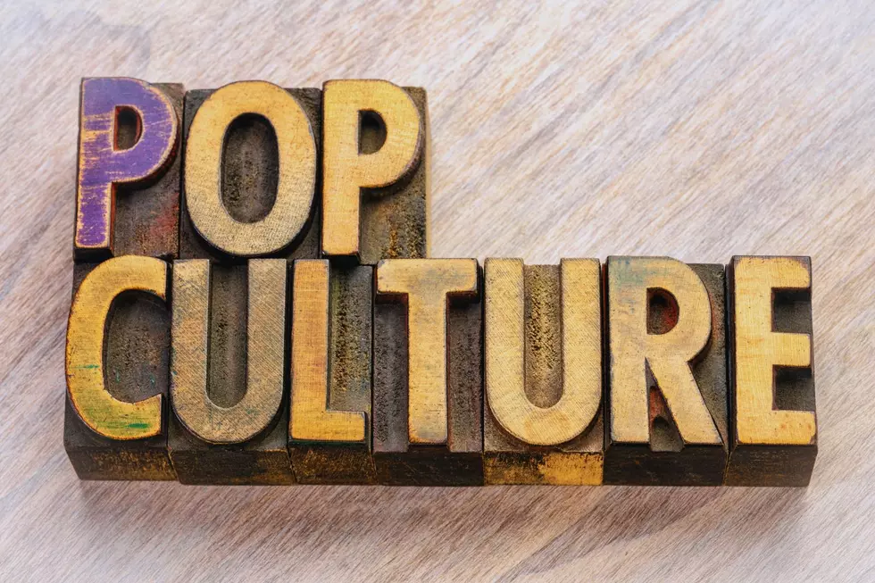 vintage letterpress wood type printing blocks spelling out the words "pop culture"