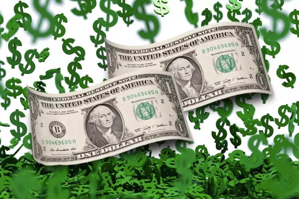 Dollar bills dollar signs