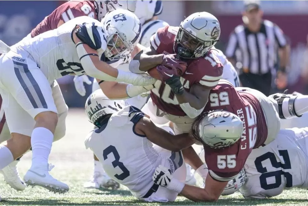 Gillman carries defenders against the Butler Bulldogs. Credit: Montana Athletics