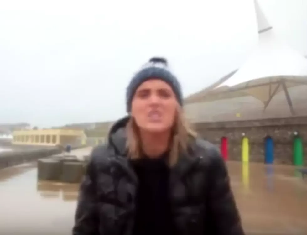 Reporter Hit by Fling Fish in Storm [VIDEO]