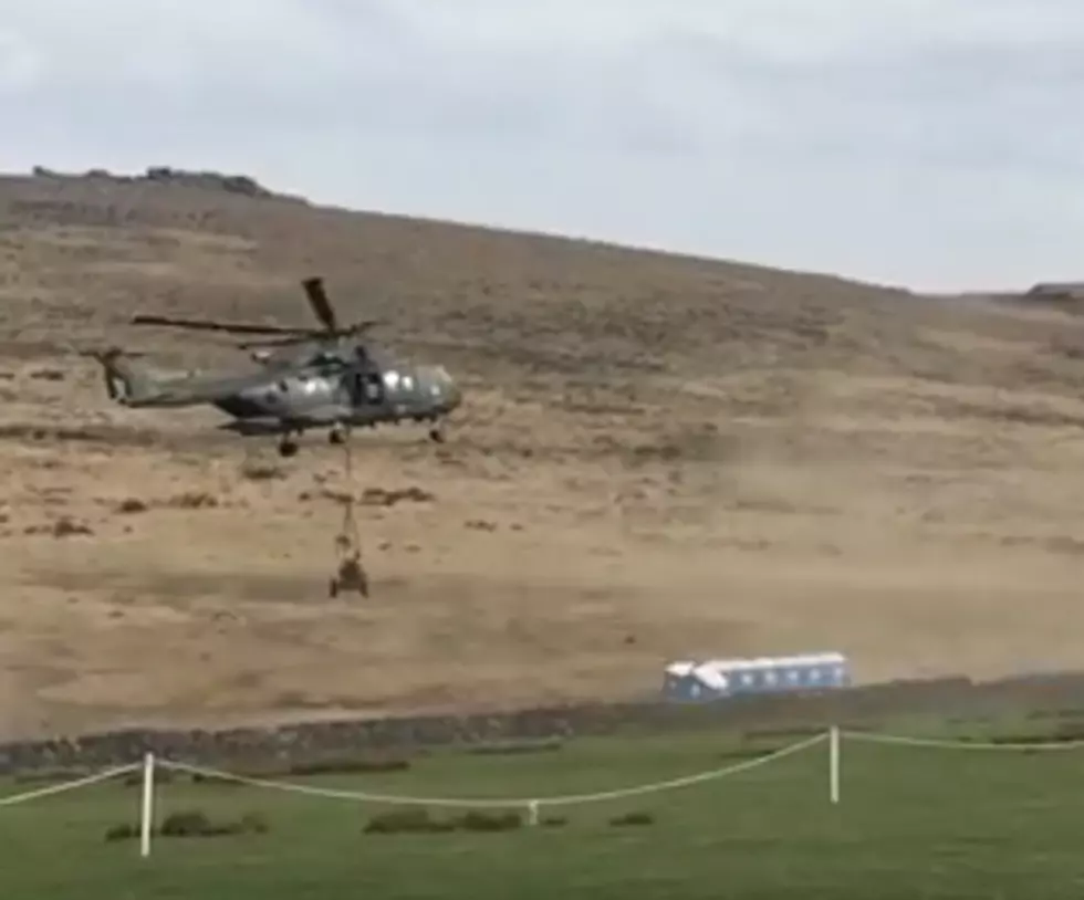 British Military Copter Accidentally Takes Out Port-a-Pottys [VIDEO]