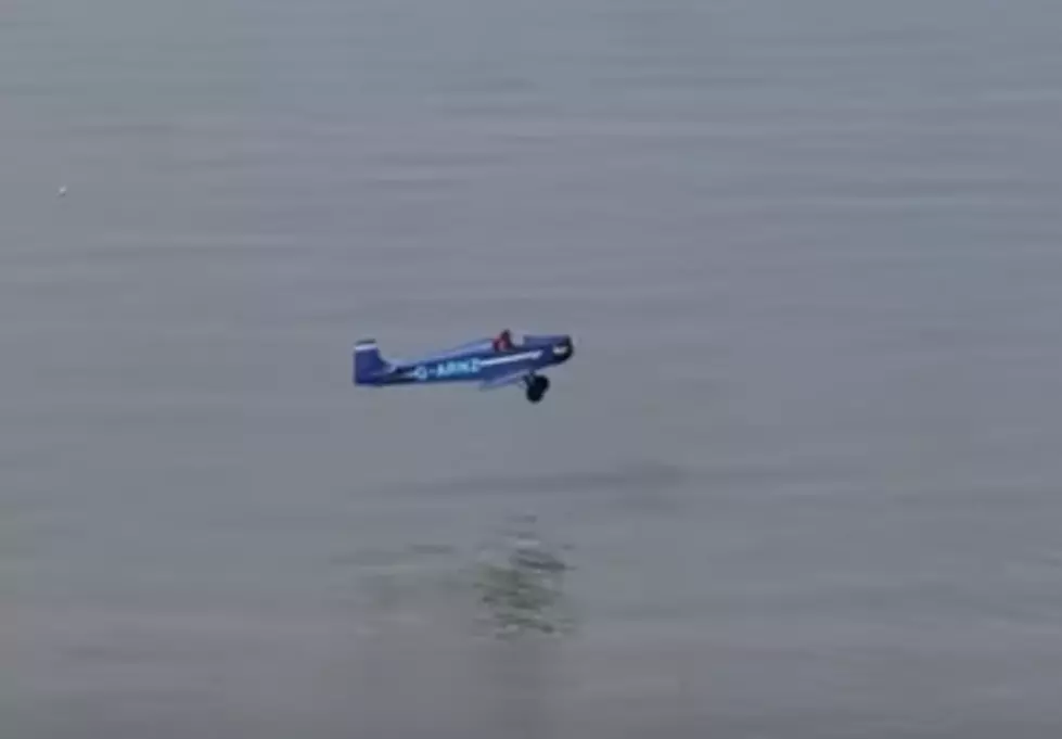 Pilot Crashes in Water During Air Show