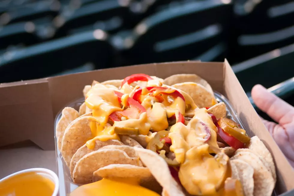 nachos in the bleachers of a baseball stadium
