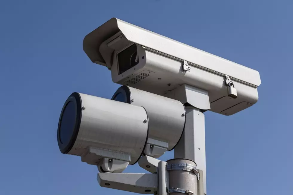 Red light cameras have been banned in Tucson. -Canva