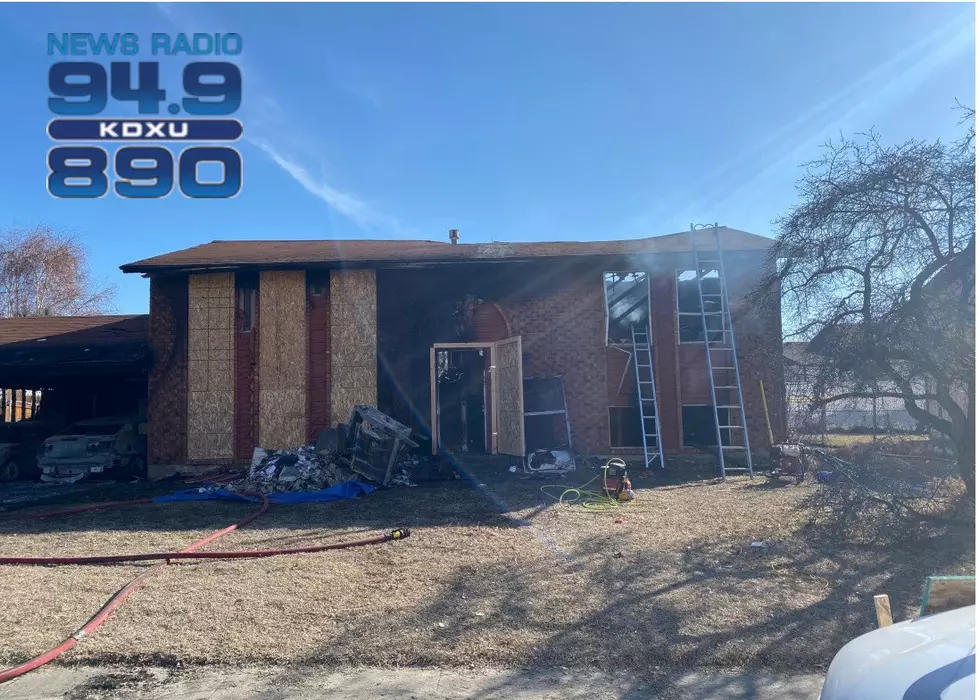 Woman dies in Roy house fire