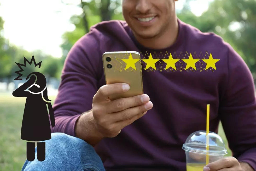 Man leave a review on his phone