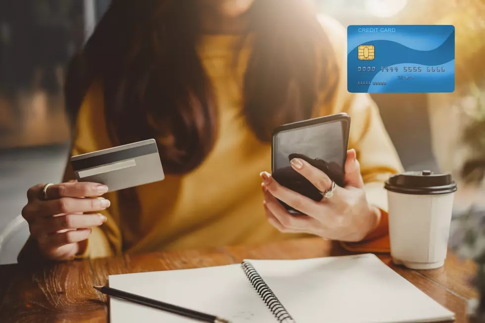 Woman reviews her card statement