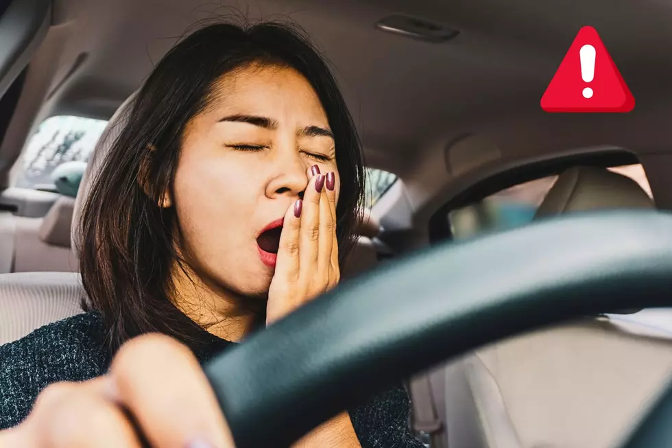 Woman driving drowsy