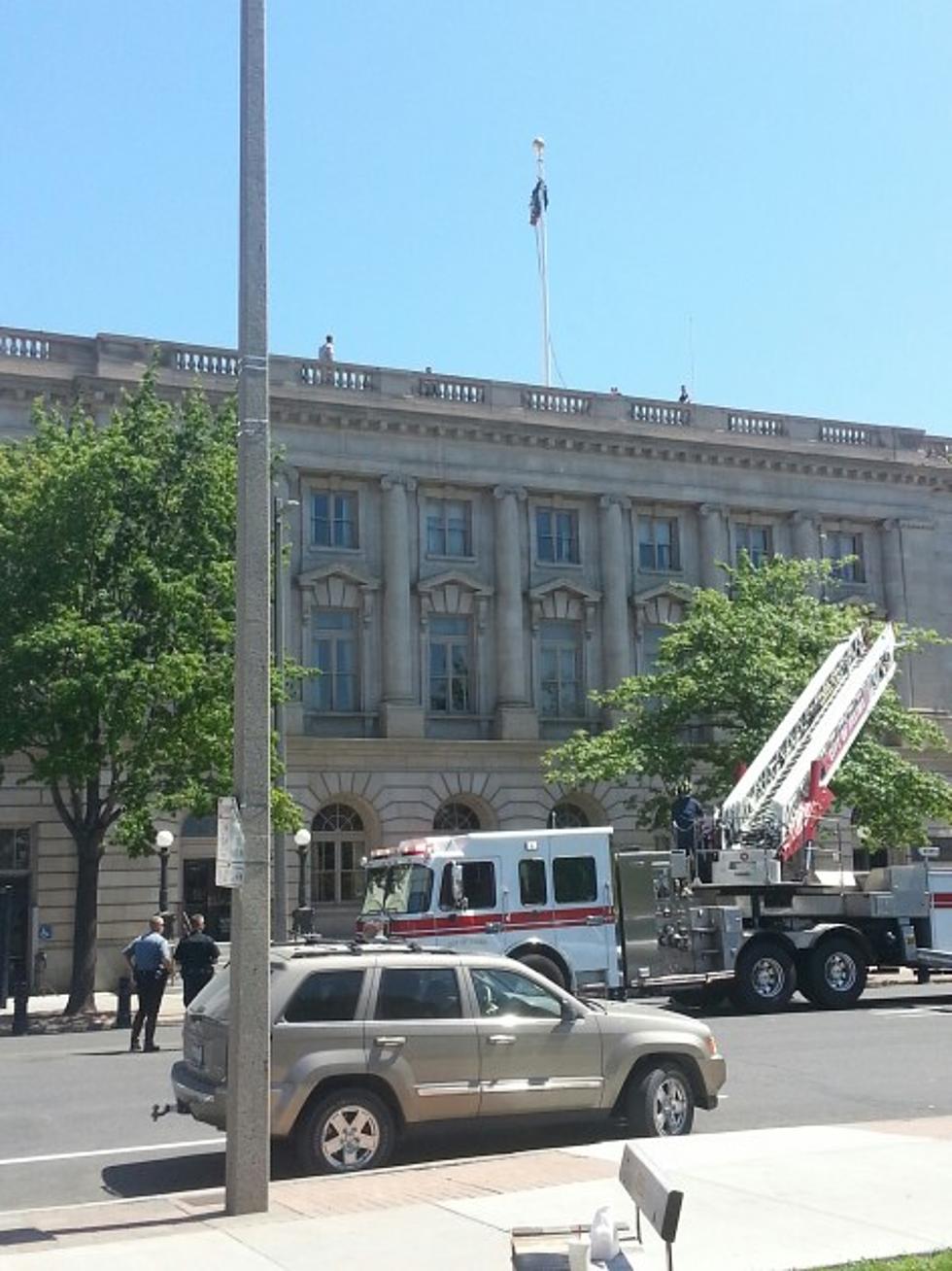 Update: Man Hanging Upside Down on Yakima Federal Courthouse Flagpole
