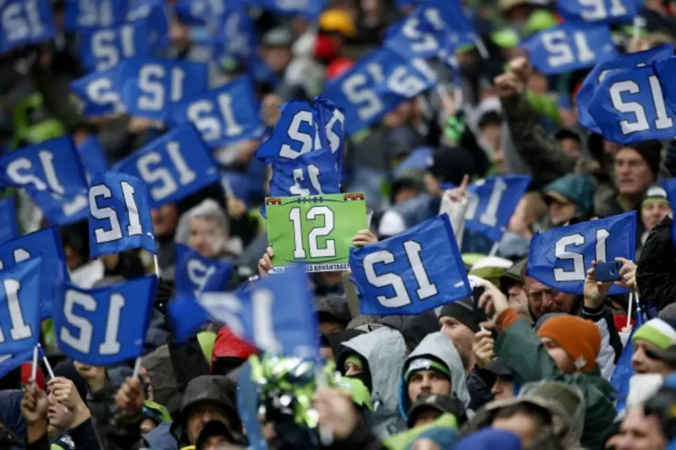 Seattle Fan Keeps His Eye on the Seahawks, Literally