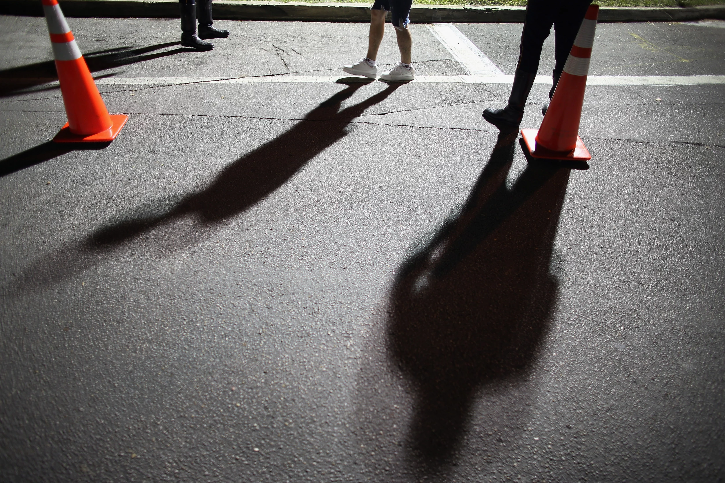 Woman Jogging In City At Night #1 by Microgen Images/science Photo Library