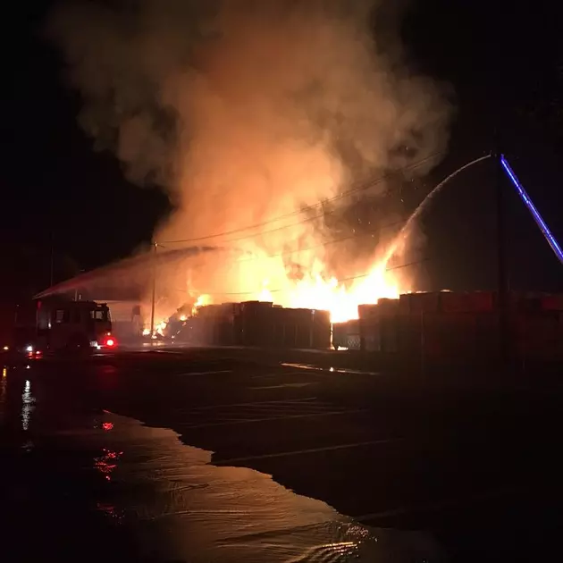 Fire At Warehouse Burns Boxes Outside