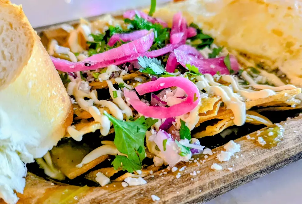 The flight of chilaquiles comes with cilantro and pickled onion garnish