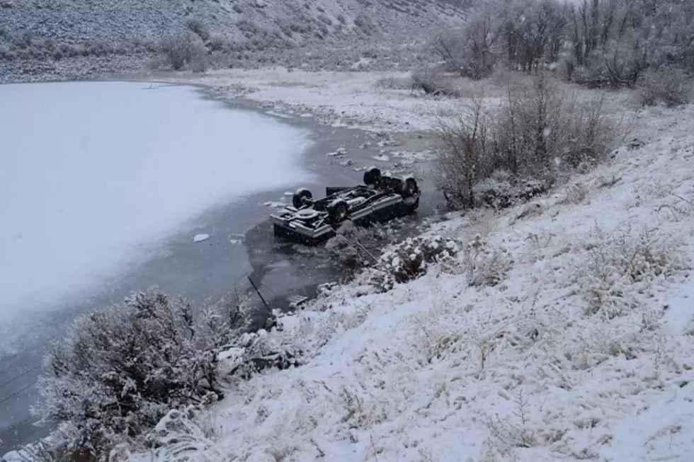 One dead after pick-up crashes into lake