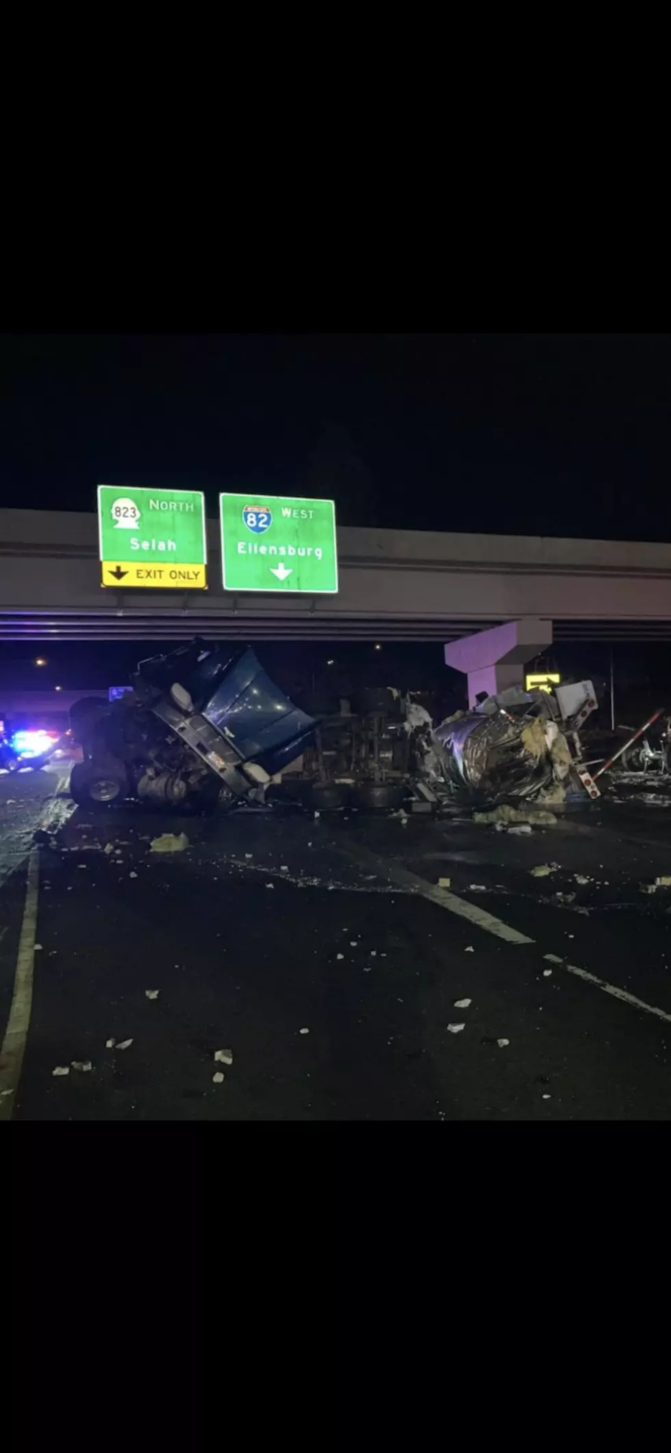 Driver Dead After Semi Rolls Off of Freeway Overpass in Yakima