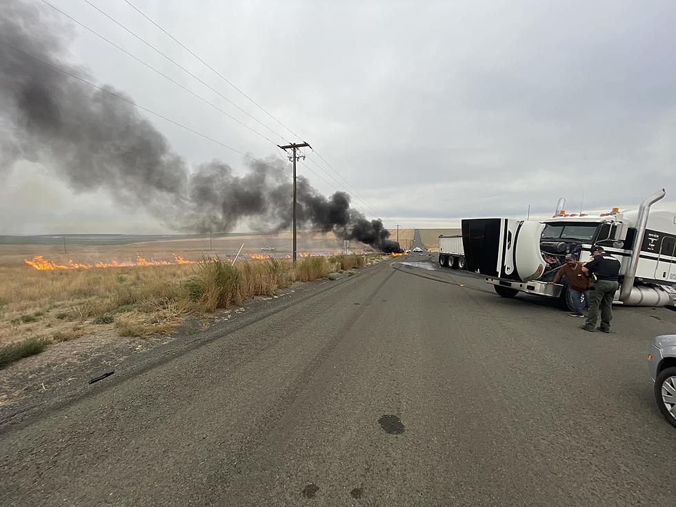 Car Collides With Semi, Sparks Brush Fire, Injures Three