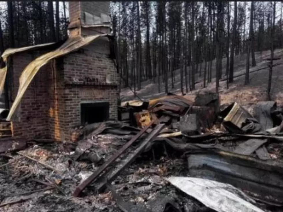 A single-family home near Nespelem lays in ruins after being consumed by the flames of the Kaiser Canyon Fire (photo credit: Fawn LaMere on Facebook)