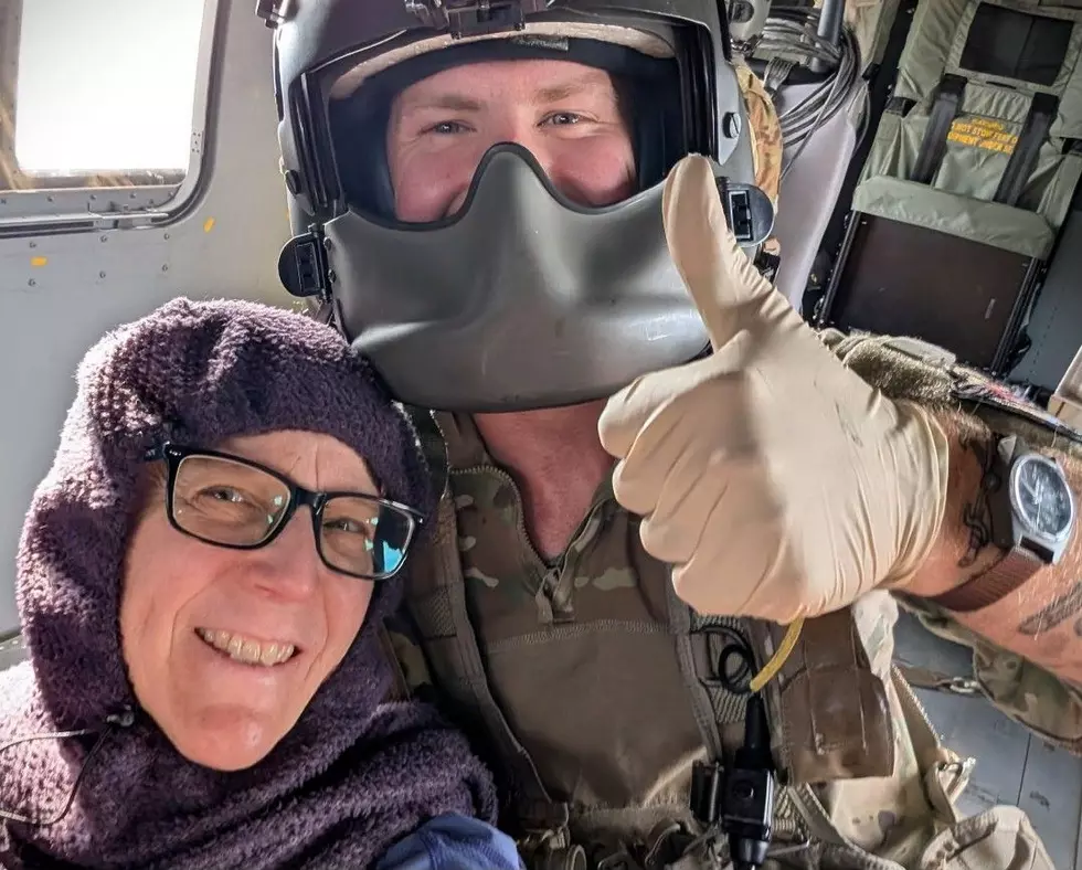 A crew member from an Army air ambulance out of Yakima takes a selfie with an injured hiker whom he helped rescue from the Pacific Crest Trail near Waptus Lake. (photo credit: Facebook)