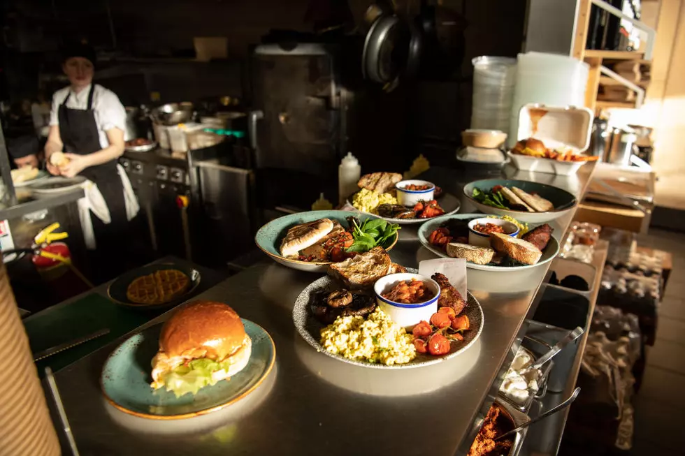 Food waits to be taken to the tables. (Photo by Leon Neal/Getty