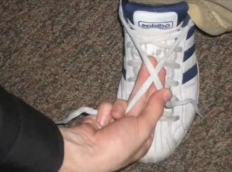 Tying shoelaces with one on sale hand