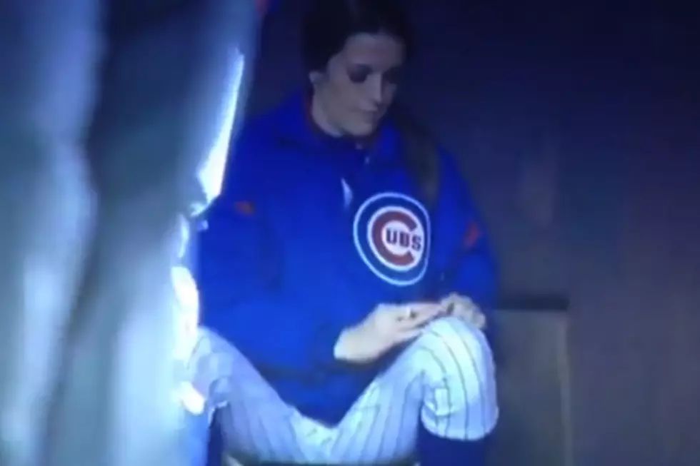 Did This Chicago Cubs Ball Girl Just Give Out Her Digits to a Fan?
