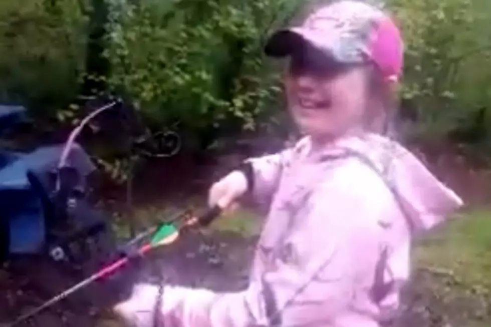 Watch Little Girl Use Her Compound Bow To Remove a Loose Tooth